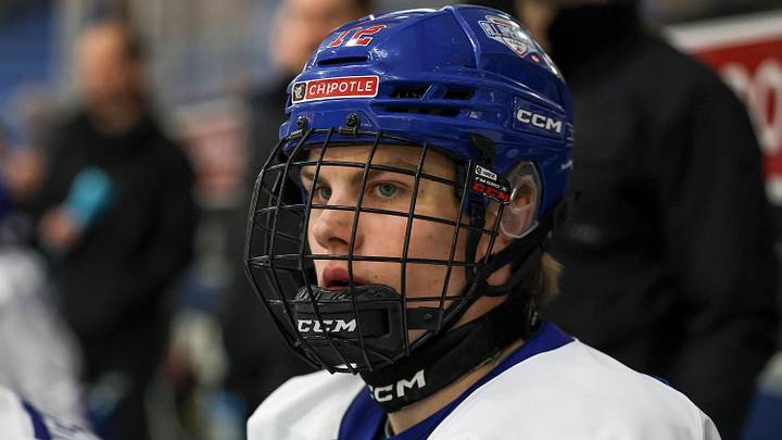 PLYMOUTH, MI - JANUARY 15: Casey Mutryn #12 of Team White concentrates on the bench during the Chipotle All American Game between Team White and Team Blue at USA Hockey Arena on January 15, 2026 in Plymouth, Michigan.