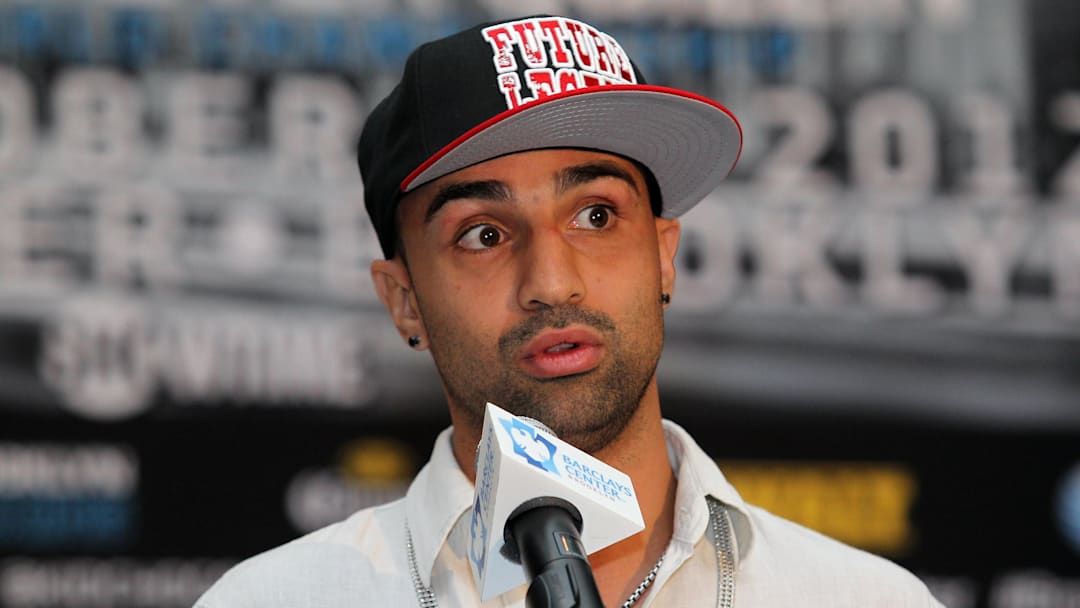 Aug 30, 2012; Brooklyn, NY, USA; WBA welterweight champion Paulie Malignaggi speaks at the press conference at New York Marriott at the Brooklyn Bridge. The press conference announced the upcoming October 20th card at the Barclay's Center.  Mandatory Credit: Ed Mulholland-Imagn Images