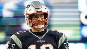 Nov 24, 2019; Foxborough, MA, USA; New England Patriots quarterback Tom Brady (12) reacts to fans during warm up before the start of the game against the Dallas Cowboys at Gillette Stadium. Mandatory Credit: David Butler II-USA TODAY Sports