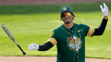 Jordan Love (10) reacts after winning then home run derby during the Green Bay Charity Softball Game on Friday, May10, 2024 at Neuroscience Group Field at Fox Cities Stadium in Grand Chute, 
Wm. Glasheen USA TODAY NETWORK-Wisconsin