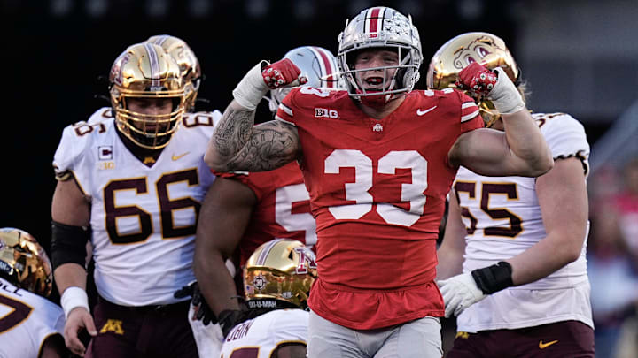 Nov 18, 2023; Columbus, Ohio, USA; Ohio State Buckeyes defensive end Jack Sawyer (33) celebrates a tackle during the first half of the NCAA football game against the Minnesota Golden Gophers at Ohio Stadium. Nov 18, 2023; Columbus, Ohio, USA; Ohio State Buckeyes defensive end Jack Sawyer (33) celebrates a tackle during the first half of the NCAA football game against the Minnesota Golden Gophers at Ohio Stadium.