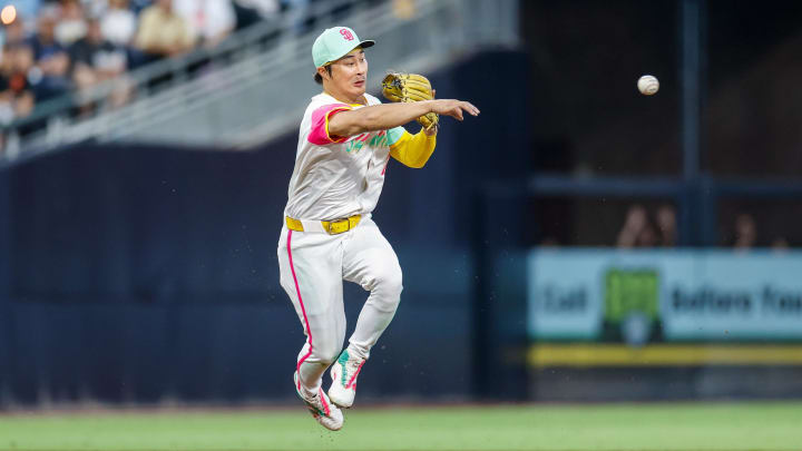 Aug 2, 2024; San Diego, California, USA; San Diego Padres shortstop Ha-Seong Kim (7) throws to second for an out starting the double play during the fourth inning against the Colorado Rockies at Petco Park. Mandatory Credit: David Frerker-USA TODAY Sports