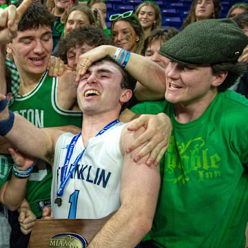 Franklin High School senior Caden Sullivan celebrates the win over Newton North, 55-52, in the Div. 1 state championship at the Tsongas Center in Lowell, March 16, 2025.