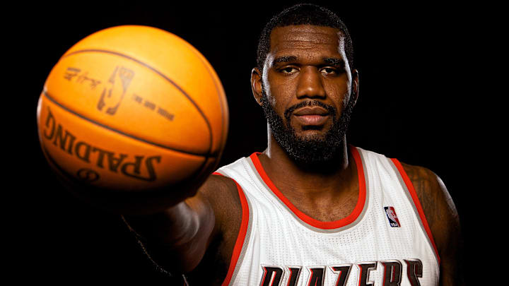 Dec 16, 2011; Portland, OR, USA; Portland Trailblazers center Greg Oden (52) poses for a photo during media day at the Rose Garden. Mandatory Credit: Craig Mitchelldyer-Imagn Images