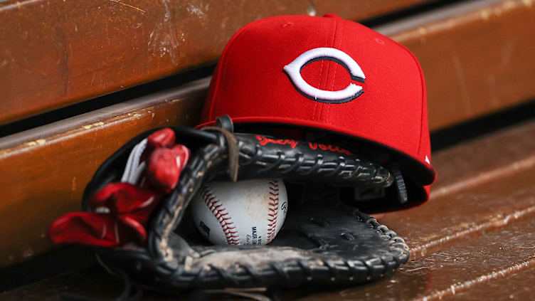 Cincinnati Reds hat in the dugout.