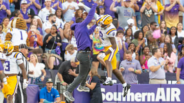 LSU WR Malik Nabors 8 celebrates with Receivers Coach Cortez Hankton after a touchdown as the LSU Tigers take on the Auburn Tigers at Tiger Stadium in Baton Rouge, Louisiana, Saturday, Oct. 14, 2023.