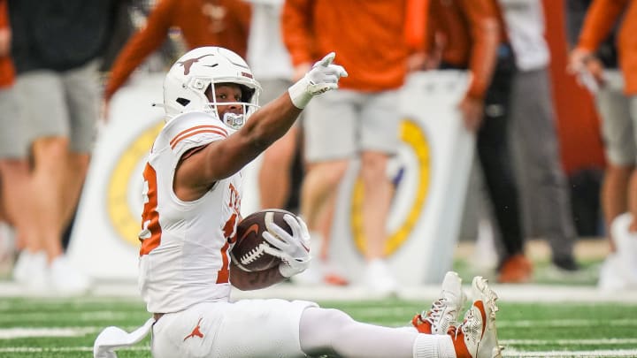 Texas White team wider receiver Ryan Niblett (18) celebrates making a catch for a first down in the second quarter of the Longhorns' spring Orange and White game at Darrell K Royal Texas Memorial Stadium in Austin, Texas, April 20, 2024.