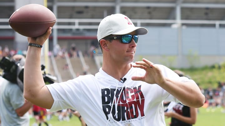 Former Iowa State quarterback and San Francisco 49ers quarterback Brock Purdy warms up at the Brock Purdy Youth Football camp at Jack Trice Stadium football practice field on Saturday, June 22, 2024, in Ames, Iowa