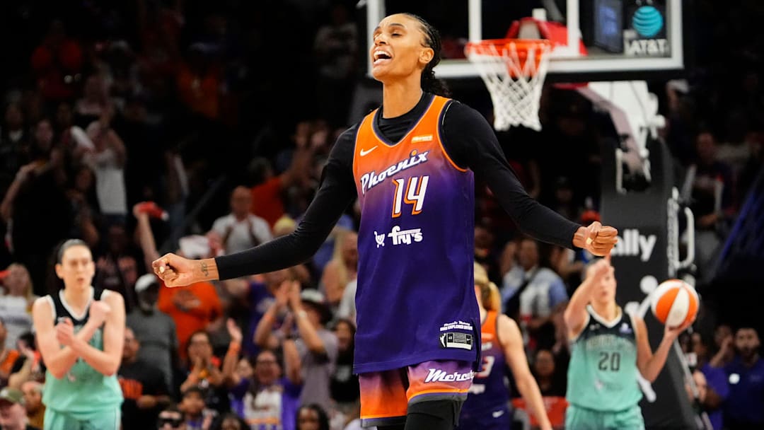 Phoenix Mercury forward DeWanna Bonner (14) reacts after making a jumper shot against the New York Liberty late in the fourth quarter during Game Three of the 2025 WNBA Playoffs first round at PHX Arena on Sept. 14, 2025, in Phoenix.