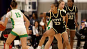 Mitty's Maliya Hunter (23) and Ze'Ni Patterson (22) play defense in Day 2 game with West Linn (Ore.), a 50-26 Monarchs' win at the Roebbelen Center in Roseville, Calif.