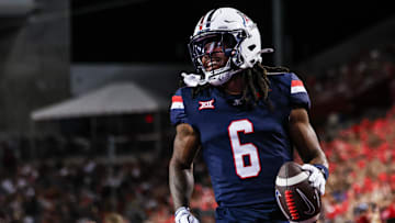 Aug 30, 2025; Tucson, Arizona, USA; Arizona Wildcats wide receiver Javin Whatley (6) reacts after running the ball right up to the edge of the end zone during the second quarter of the game against the Hawaii Rainbow Warriors at Arizona Stadium. Mandatory Credit: Aryanna Frank-Imagn Images