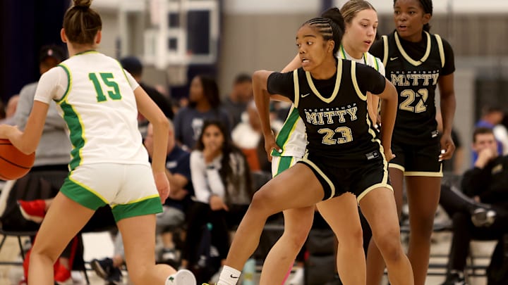 Mitty's Maliya Hunter (23) and Ze'Ni Patterson (22) play defense in Day 2 game with West Linn (Ore.), a 50-26 Monarchs' win at the Roebbelen Center in Roseville, Calif.