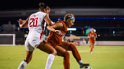 Texas Longhorns forward Chloe Shimkin (7) attempts to get around defense from Houston Cougars defender Talia Feigin (20) in the second half of the Longhorn's season opener against the Houston Cougars, Aug. 15, 2024 at Mike A. Meyers Stadium and Soccer Field in Austin, Texas. Texas won the game 1-0.