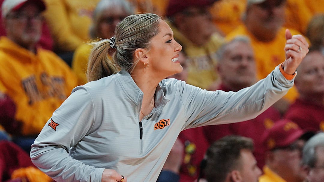 Oklahoma State Cowgirls head coach Jacie Hoyt reacts after a score against Iowa State during the second quarter in the senior day women basketball at Hilton Coliseum on February. 25, 2026, in Ames, Iowa. Oklahoma State Cowgirls head coach Jacie Hoyt reacts after a score against Iowa State during the second quarter in the senior day women basketball at Hilton Coliseum on February. 25, 2026, in Ames, Iowa.