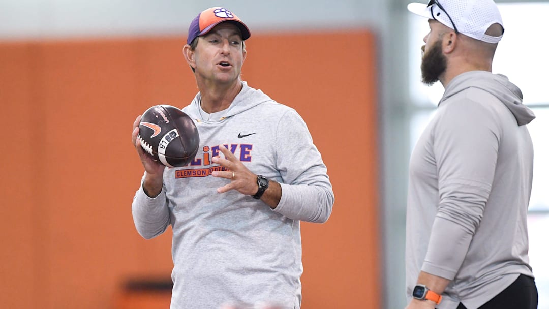 Clemson head coach Dabo Swinney talks with Clemson linebackers coach Ben Boulware during Spring Practice in Clemson, S.C. Monday, March 24, 2025.