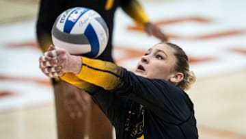 Missouri Tigers setter Marina Crownover (22), a former Texas Longhorn, bumps the ball during the Longhorns' match-up with the Missouri Tigers at the Gregory Gym in Austin, Nov. 1, 2024.
