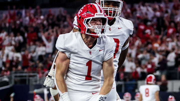 Grayson Rigdon celebrates a touchdown Thursday night in the Texas high school football state championship game against Malakoff. Grayson Rigdon celebrates a touchdown Thursday night in the Texas high school football state championship game against Malakoff.