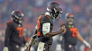 Cleveland Browns quarterback Shedeur Sanders (12) hangs his head as he comes off the field after failing on a two-point conversion attempt during the second half of an NFL football game at Huntington Bank Field, Dec. 7, 2025, in Cleveland, Ohio.