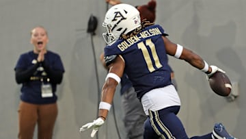Akron Zips cornerback Devonte Golden-Nelson celebrates in the end zone after a first-half pick six against Morgan State, Saturday, Sept. 9, 2023.