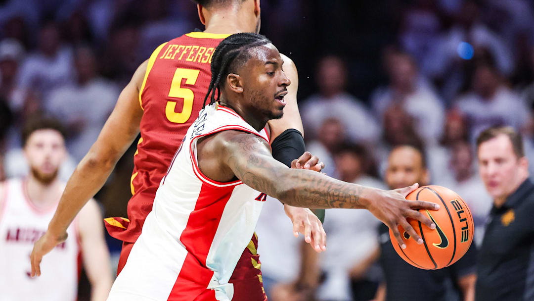 Mar 2, 2026; Tucson, Arizona, USA; Iowa State Cyclones forward Joshua Jefferson (5) fouls Arizona Wildcats guard Jaden Bradley (0) during the first half of the game at McKale Memorial Center. Mandatory Credit: Aryanna Frank-Imagn Images