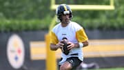 Pittsburgh Steelers quarterback Aaron Rodgers (8) drops back to pass during minicamp at their South Side facility. 