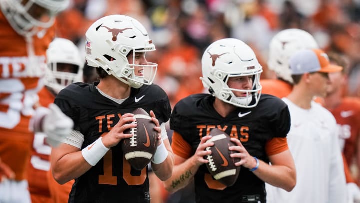 April 20, 2024; Austin, Texas, USA: Texas Longhorns quarterbacks Arch Manning (16), left, and  Quinn Ewers (3) throw passes while warming up ahead of the Longhorns' spring Orange and White game at Darrell K Royal Texas Memorial Stadium. Mandatory Credit: Sara Diggins-USA Today Sports via American Statesman