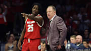 Dec 9, 2023; Tucson, Arizona, USA; Wisconsin Badgers guard John Blackwell (25) talks to Wisconsin Badgers head coach Greg Gard during the second half at McKale Center.
