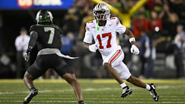 Oct 12, 2024; Eugene, Oregon, USA; Ohio State Buckeyes wide receiver Carnell Tate (17) runs a pass route during the second half against Oregon Ducks defensive back Jabbar Muhammad (7) at Autzen Stadium.