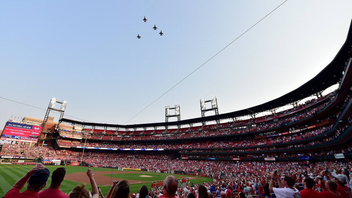 Sep 11, 2021; St. Louis, Missouri, USA;  Fans look on during a fly over to honor the 20th