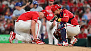 Aug 17, 2024; St. Louis, Missouri, USA; St. Louis Cardinals catcher Willson Contreras (40, right) visits the mound to talk with St. Louis Cardinals pitcher Andre Pallante (53) as he ties his shoelace in the sixth inning at Busch Stadium in a game against the Los Angeles Dodgers. Mandatory Credit: Tim Vizer-Imagn Images