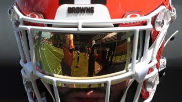 Browns defensive coordinator Jim Schwartz is reflected in safety Juan Thornhill's visor during minicamp, Tuesday, June 11, 2024, in Berea.