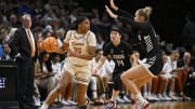 Mar 29, 2024; Portland, OR, USA; Texas Longhorns forward Madison Booker (35) looks to pass during the second half against Gonzaga Bulldogs guard Esther Little (0) and guard Kaylynne Truong (14) in the semifinals of the Portland Regional of the 2024 NCAA Tournament at the Moda Center at the Moda Center. Mandatory Credit: Troy Wayrynen-USA TODAY Sports