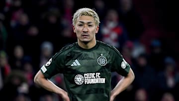 Celtic forward Daizen Maeda stands on the pitch during UCL second leg knock-out playoff match against Bayern Munich. 