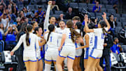 Caruthers players celebrate winning the California (CIF) State Division 2 championship at the Golden 1 Center in Sacramento.