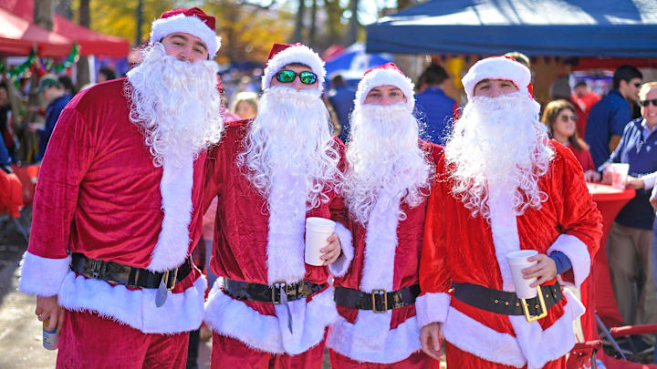 Ole Miss fans tailgate before the Rebels battle Tulane in the first round of the College Football Playoff.