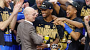 Oklahoma City Thunder guard Shai Gilgeous-Alexander hugs NBA Commissioner Adam Silver after the NBA Finals. 