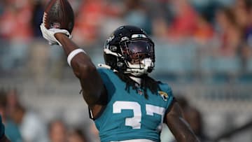 Jacksonville Jaguars cornerback Tre Flowers (37) throws the ball to fans in the stands as he warmed up ahead of the start of Saturday's game against the Chiefs. The Jaguars led 20 to 10 at the end of the first half. The Jacksonville Jaguars hosted the Kansas City Chiefs in the Jaguars first preseason game of the season Saturday, August10, 2024 at EverBank Stadium in Jacksonville, Fla. [Bob Self/Florida Times-Union]
