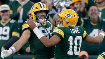 Green Bay Packers tight end Tucker Kraft (85) and quarterback Jordan Love (10) celebrate a fourth-quarter touchdown against the Cincinnati Bengals on Sunday, October 12, 2025, at Lambeau Field in Green Bay, Wis.
