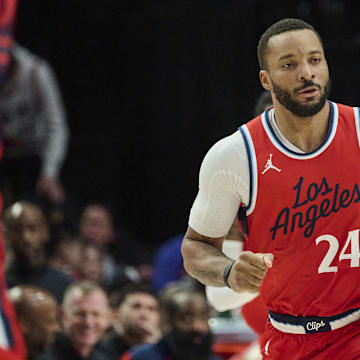Jan 16, 2025; Portland, Oregon, USA;  LA Clippers guard Norman Powell (24) returns to defense after scoring a three point basket during the second half against the Portland Trail Blazers at Moda Center. Mandatory Credit: Troy Wayrynen-Imagn Images