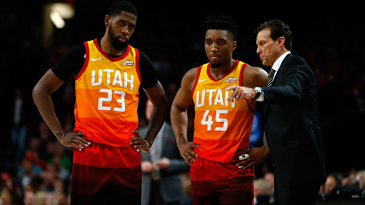 Jazz head coach Quin Snyder talks with Donavan Mitchell and Royce O'Neale from the sidelines, as Utah blew yet another 4th quarter lead in Game 2.