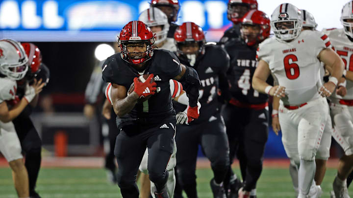 Imhotep Charter running back breaks away from the defense in the 2023 PIAA Class 5A state championship game against Peters Township. 