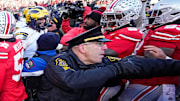 University of Michigan and Ohio State Police intervene as Michigan Wolverines and Ohio State Buckeyes fight following the NCAA football game at Ohio Stadium in Columbus on Saturday, Nov. 30, 2024. Michigan won 13-10.