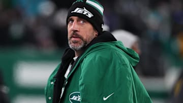 Jan 5, 2025; East Rutherford, New Jersey, USA; New York Jets quarterback Aaron Rodgers (8) during the third quarter of their game against the Miami Dolphins at MetLife Stadium. Mandatory Credit: Ed Mulholland-Imagn Images
