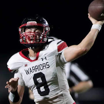 Muskego High School quarterback Joey Shaw (8) passes the ball versus Neenah in a non-conference game on Friday, August 22, 2025.
