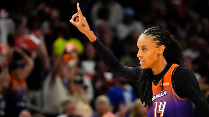 Phoenix Mercury forward DeWanna Bonner (14) reacts after making a jumper shot against the New York Liberty late in the fourth quarter during Game Three of the 2025 WNBA Playoffs first round at PHX Arena on Sept. 19, 2025, in Phoenix.