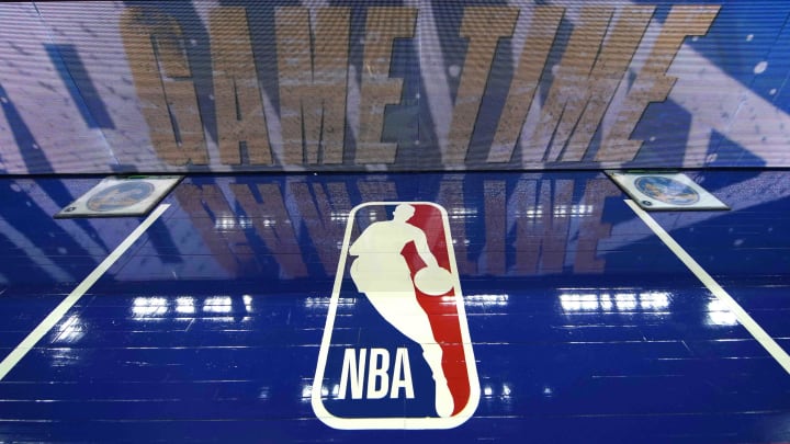 Mar 12, 2022; San Francisco, California, USA; A view of the NBA logo painted on the sideline before the game between the Golden State Warriors and the Milwaukee Bucks at Chase Center.