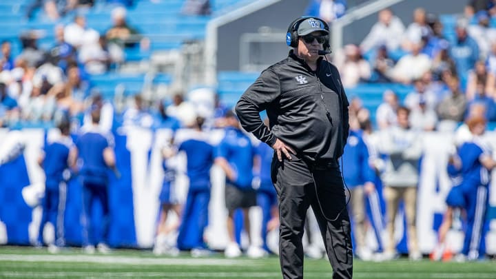 Kentucky head coach Mark Stoops looked on as his team went through drills during the Kentucky Wildcats' Blue White scrimmage at Kroger Field on Saturday afternoon in Lexington, Kentucky. April 13, 2024
