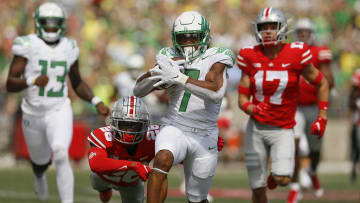 Oregon running back CJ Verdell runs past Ohio State  safety Bryson Shaw (17) and cornerback Cameron Brown (26) for a 77-yard touchdown on Saturday. Verdell scored two touchdowns.

Oregon Ducks At Ohio State Buckeyes Football