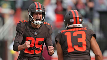 Cleveland Browns kicker Andre Szmyt (25) celebrates with punter Corey Bojorquez (13) after kicking the game-winning field goal in an NFL football game against the Green Bay Packers at Huntington Bank Field, Sept. 21, 2025, in Cleveland, Ohio.