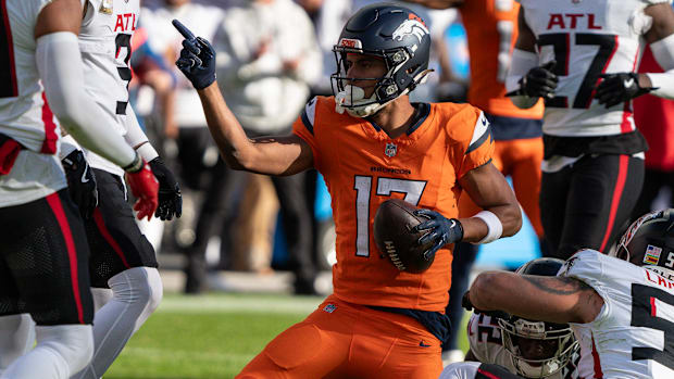 Denver Broncos wide receiver Devaughn Vele (17) signals first down after a catch vs. the Atlanta Falcons.